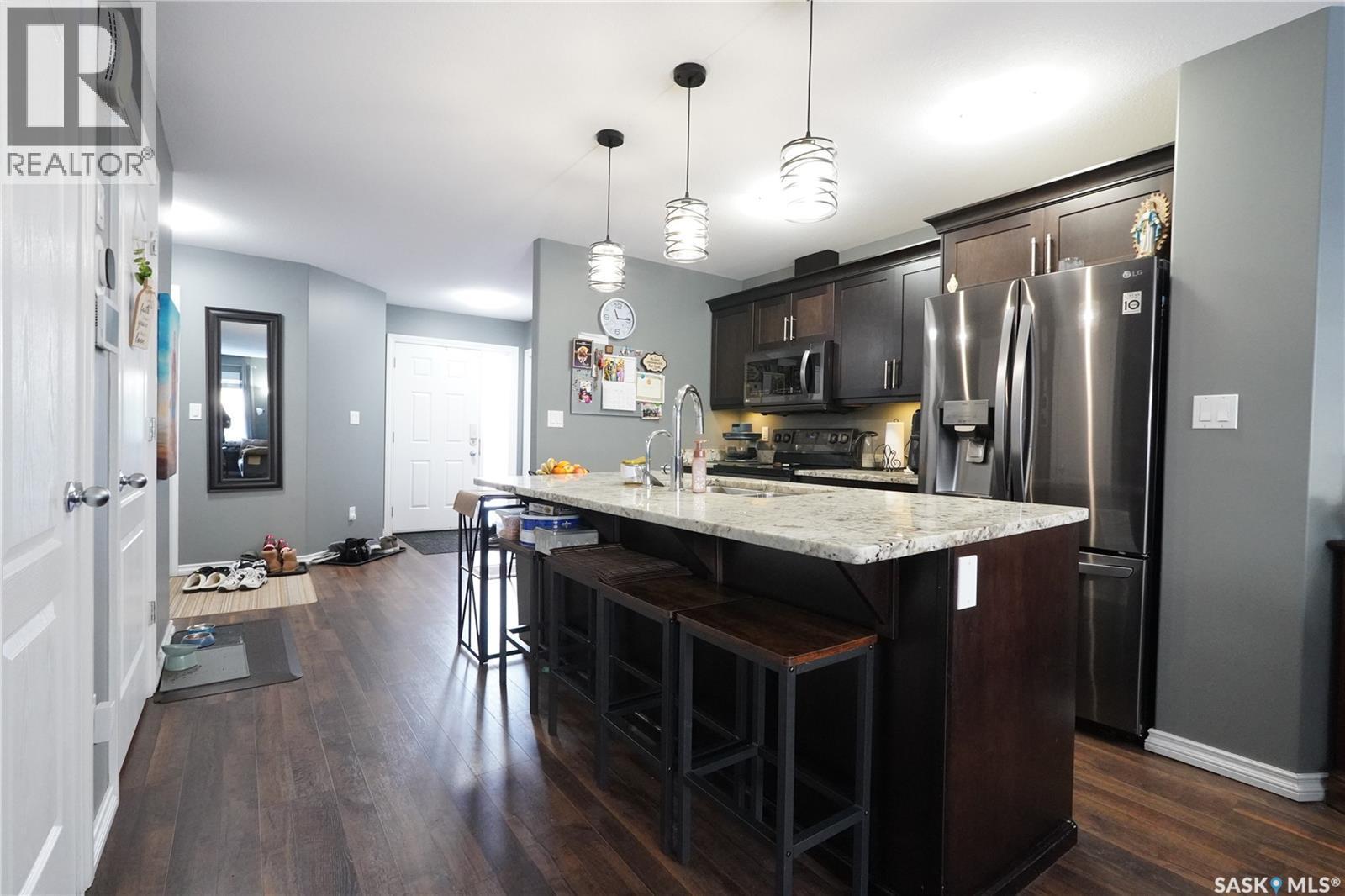 4514 Harbour Village Way, Regina, SK - Indoor Photo Showing Kitchen With Upgraded Kitchen