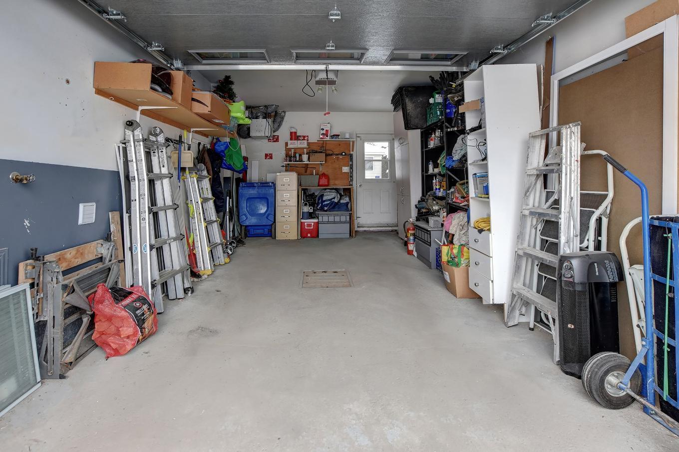 Garage - 1455 Place De Tournai, Terrebonne (Terrebonne), QC - Indoor Photo Showing Garage