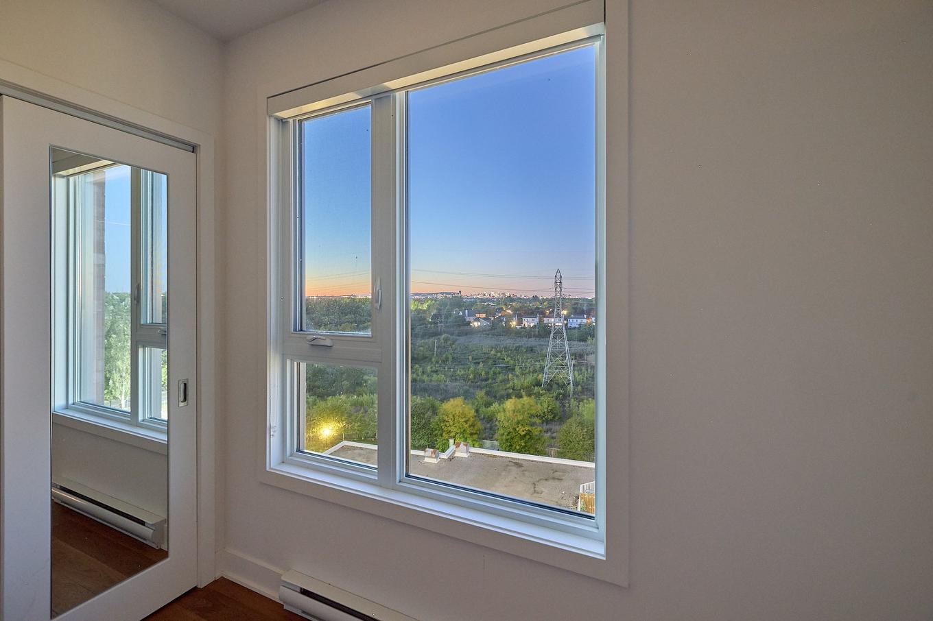 Vue d'ensemble - 712-64 Ch. St-François-Xavier, Candiac, QC - Indoor Photo Showing Other Room