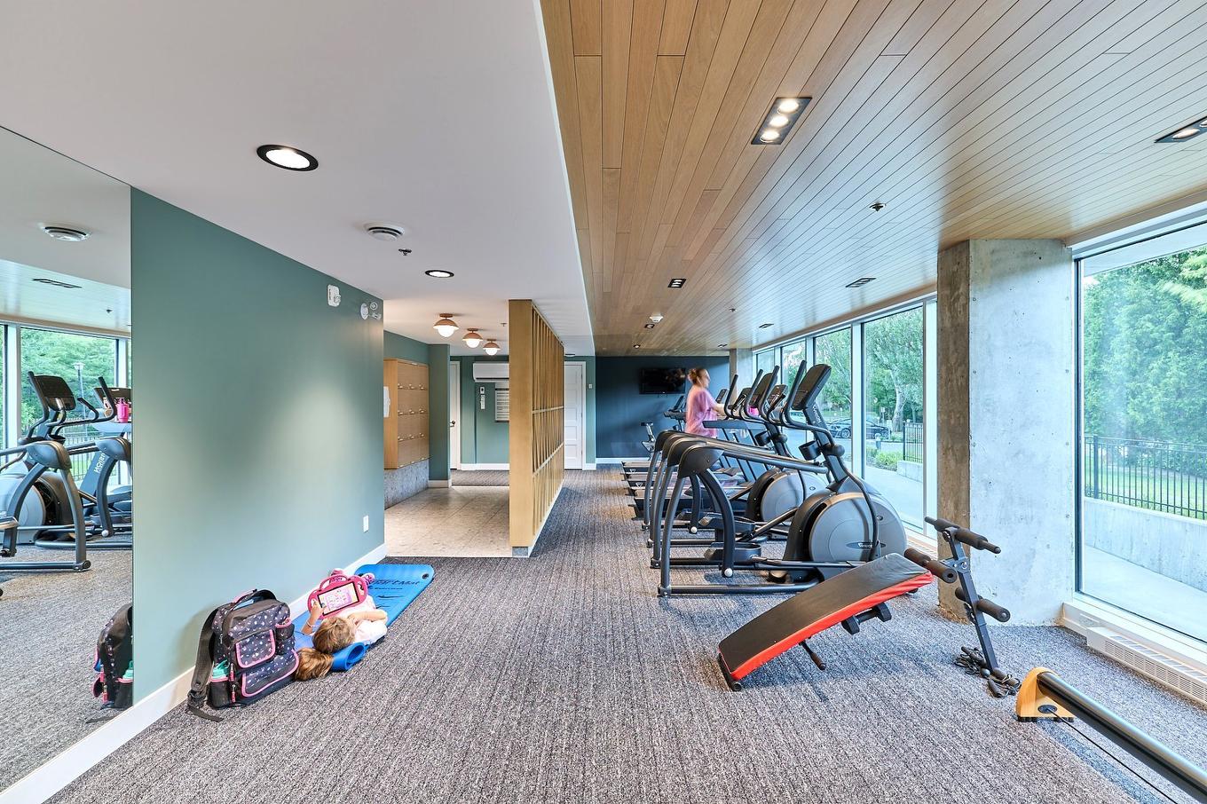 Salle d'exercice - 712-64 Ch. St-François-Xavier, Candiac, QC - Indoor Photo Showing Gym Room