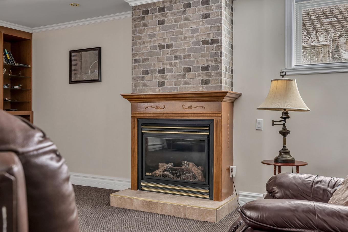 Salle familiale - 4359 Rue Des Tourne-Pierres, Québec (Charlesbourg), QC - Indoor Photo Showing Living Room With Fireplace