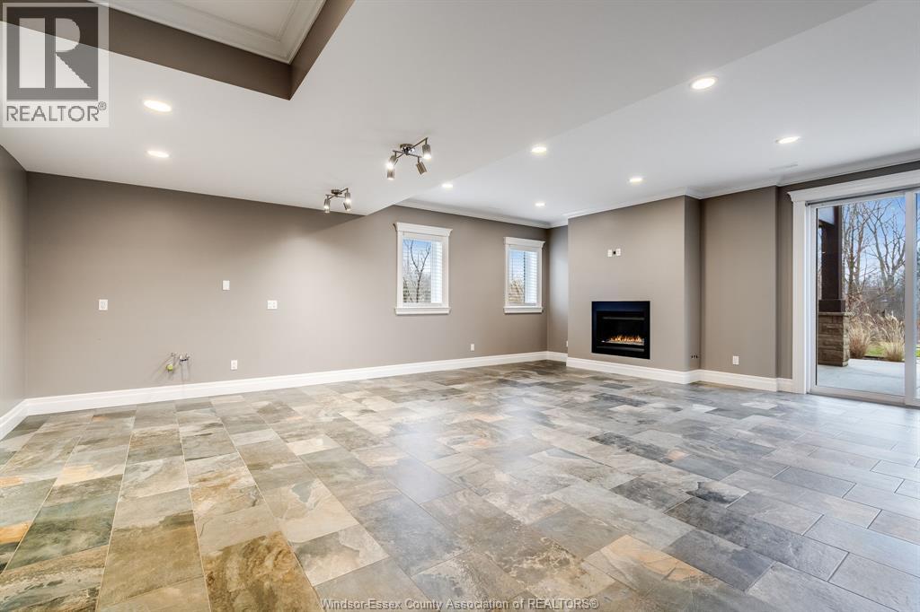 6 Two Creeks, Wheatley, ON - Indoor With Fireplace