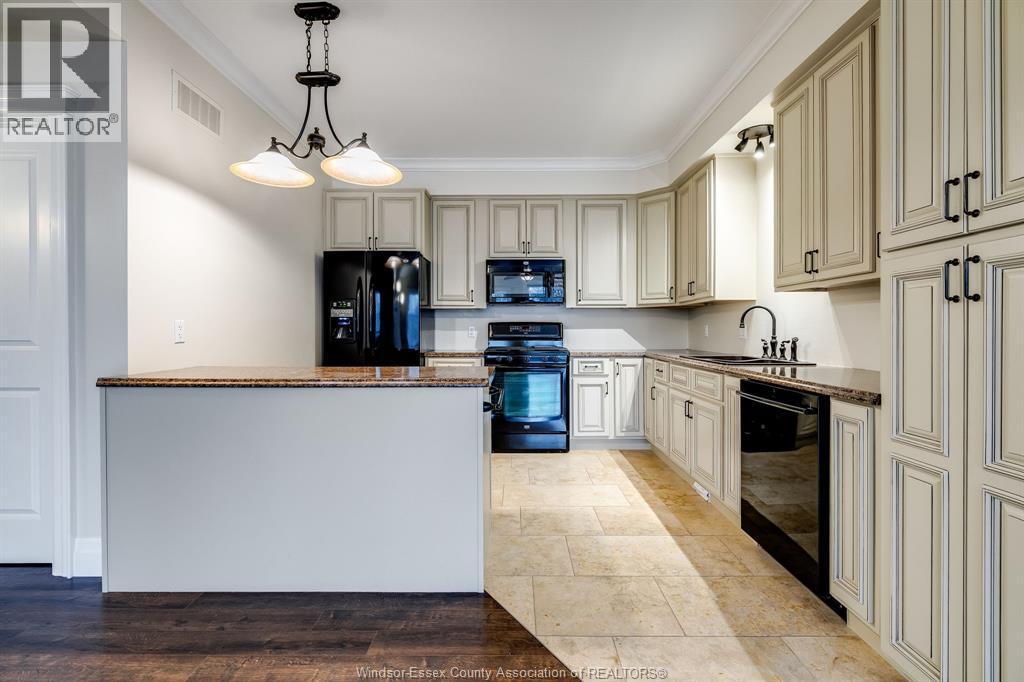 6 Two Creeks, Wheatley, ON - Indoor Photo Showing Kitchen
