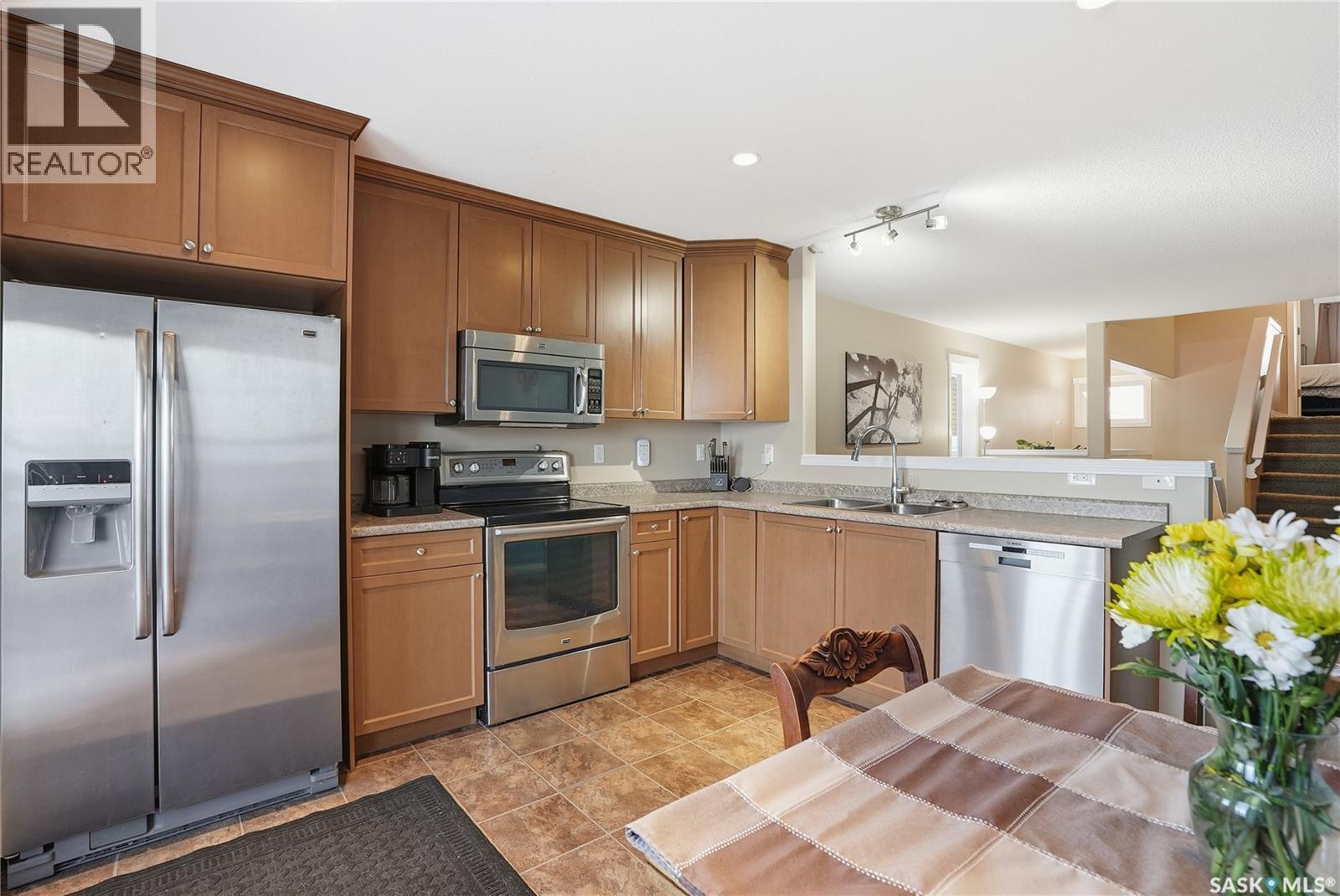 219 Henick Crescent, Saskatoon, SK - Indoor Photo Showing Kitchen With Double Sink