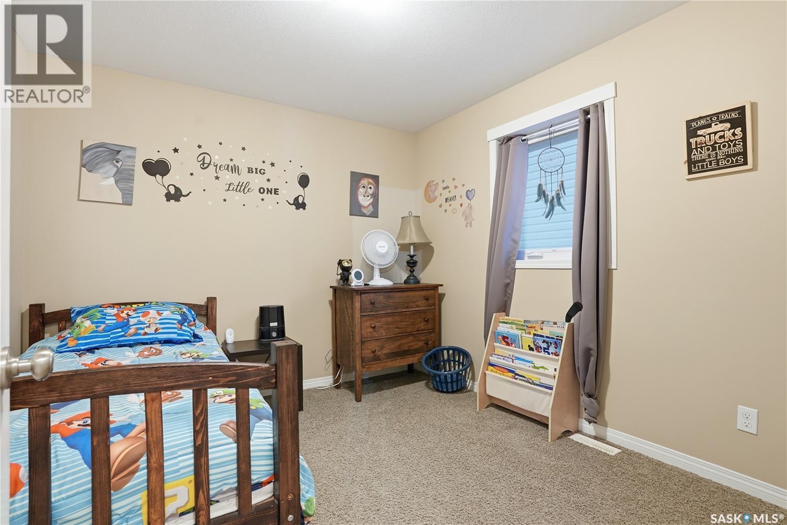 219 Henick Crescent, Saskatoon, SK - Indoor Photo Showing Bedroom