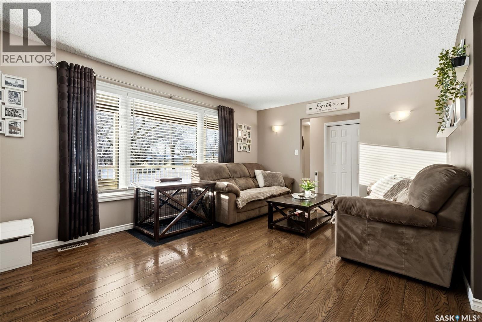 63 Champ Crescent, Regina, SK - Indoor Photo Showing Living Room