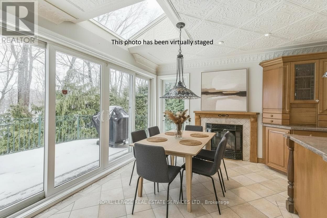 This photo has been virtually staged - 4261 Bridlepath Trail, Mississauga, ON - Indoor Photo Showing Dining Room