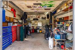 Inside garage and 8,000 lb. hoist -
