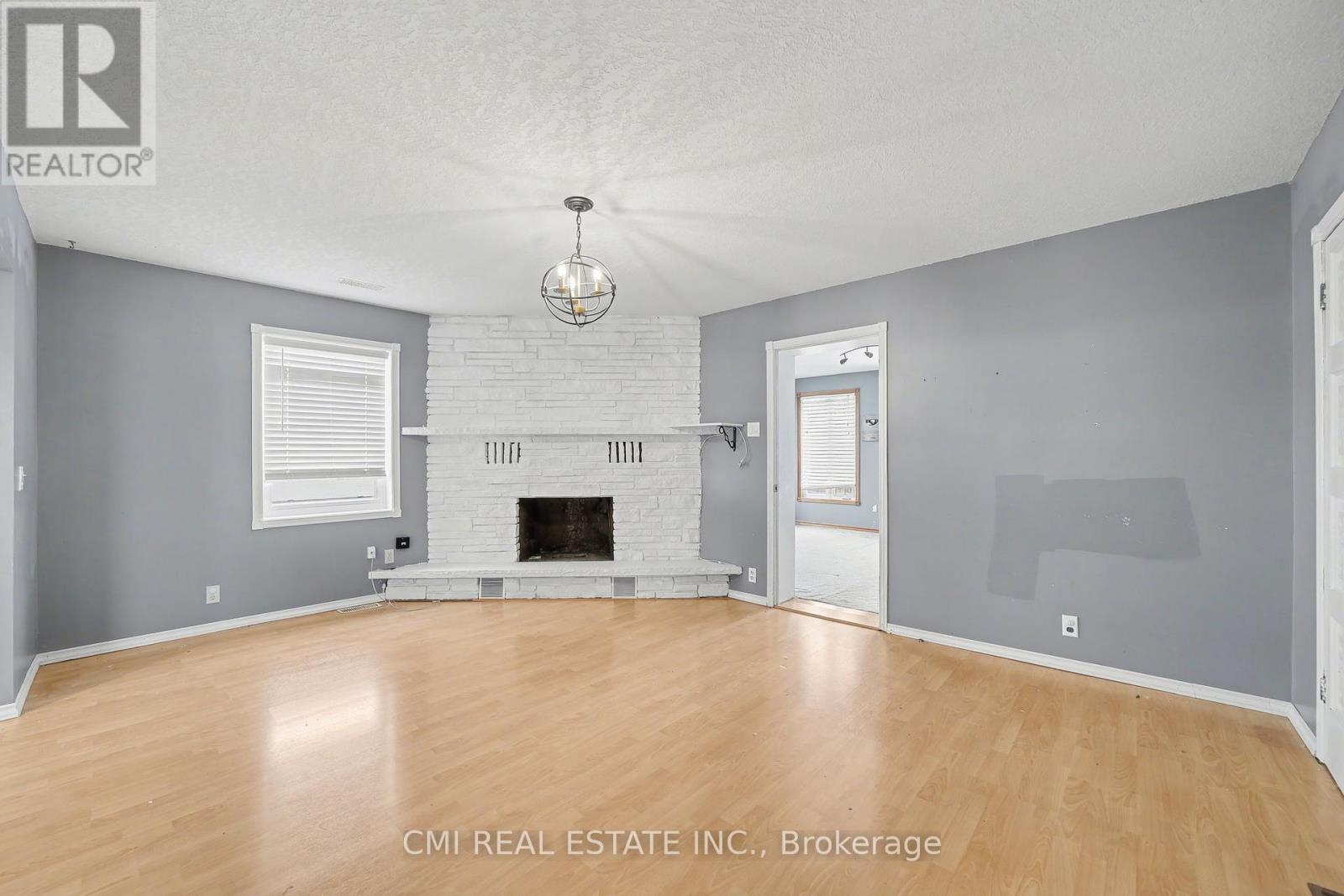 76 Main Street E, Mapleton, ON - Indoor With Fireplace