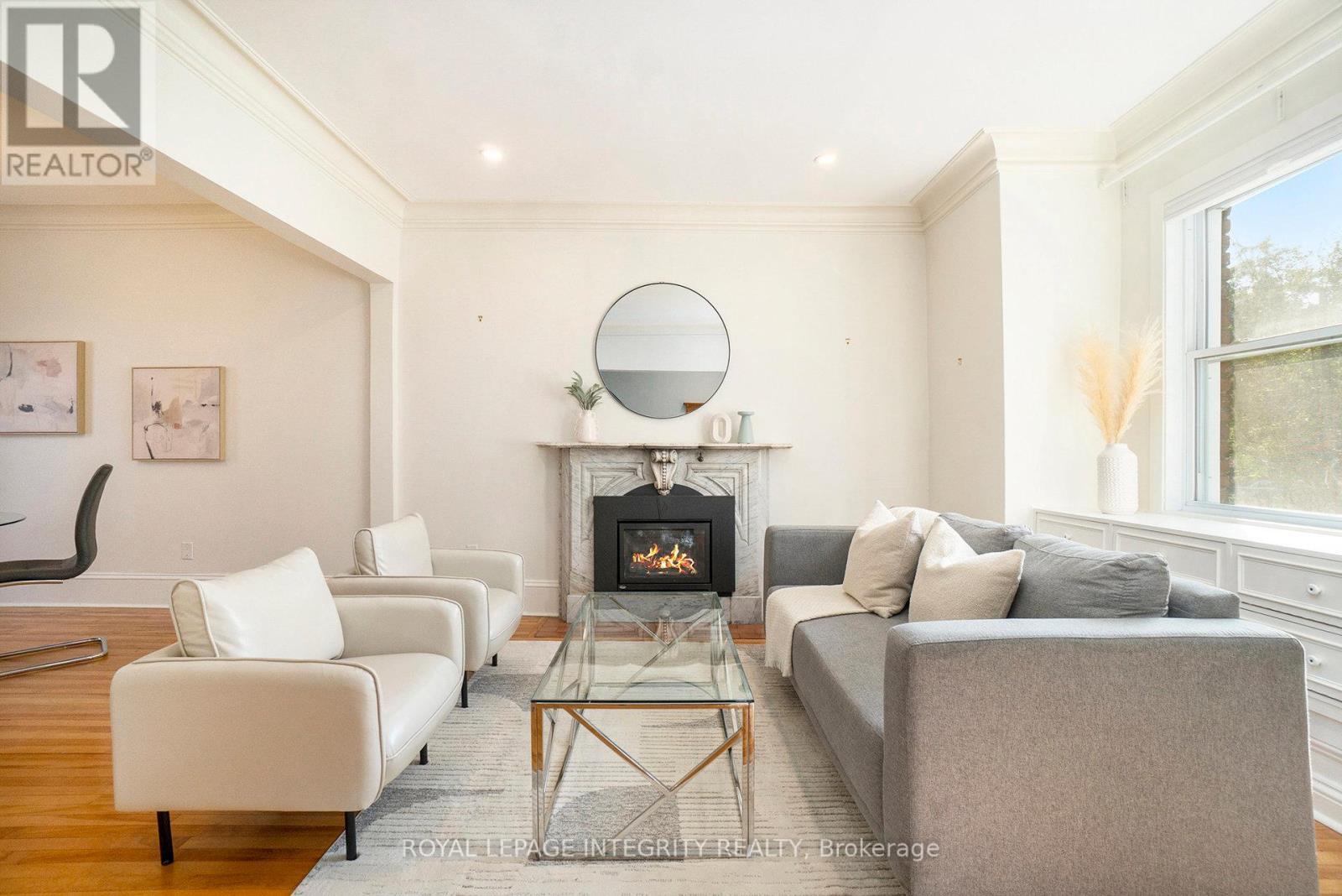 115 Springhurst Avenue, Ottawa, ON - Indoor Photo Showing Living Room With Fireplace