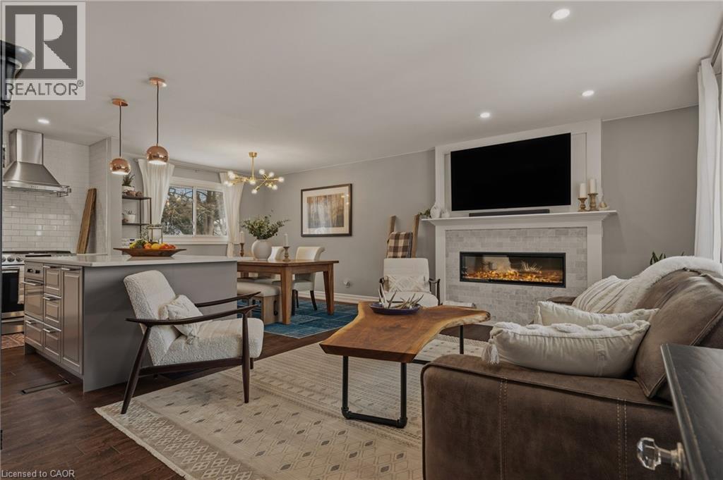 Open Concept Living/Dining/Kitchen area. Ideal spot for entertaining or a cozy winter night in. - 2424 Eileen Drive, Burlington, ON