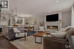 Open Concept Living/Dining/Kitchen area. Ideal spot for entertaining or a cozy winter night in. -