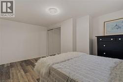 In law suite bedroom with double mirrored closet -