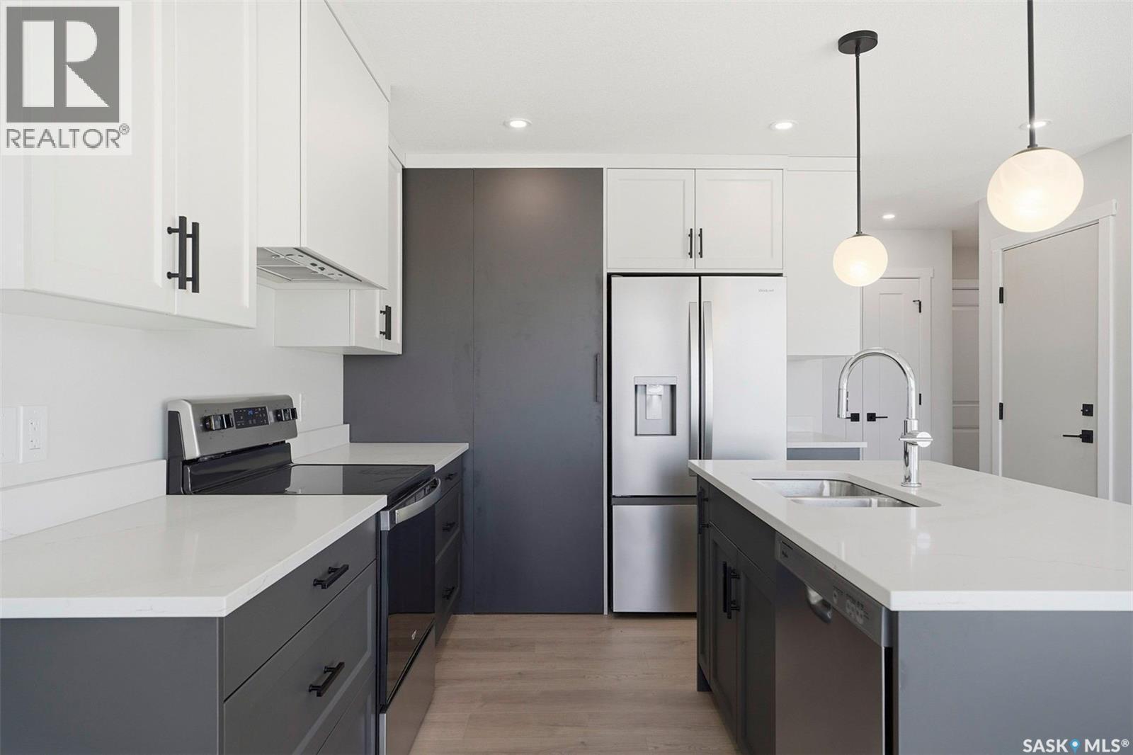 416 155 Mcfaull Way, Saskatoon, SK - Indoor Photo Showing Kitchen With Double Sink With Upgraded Kitchen