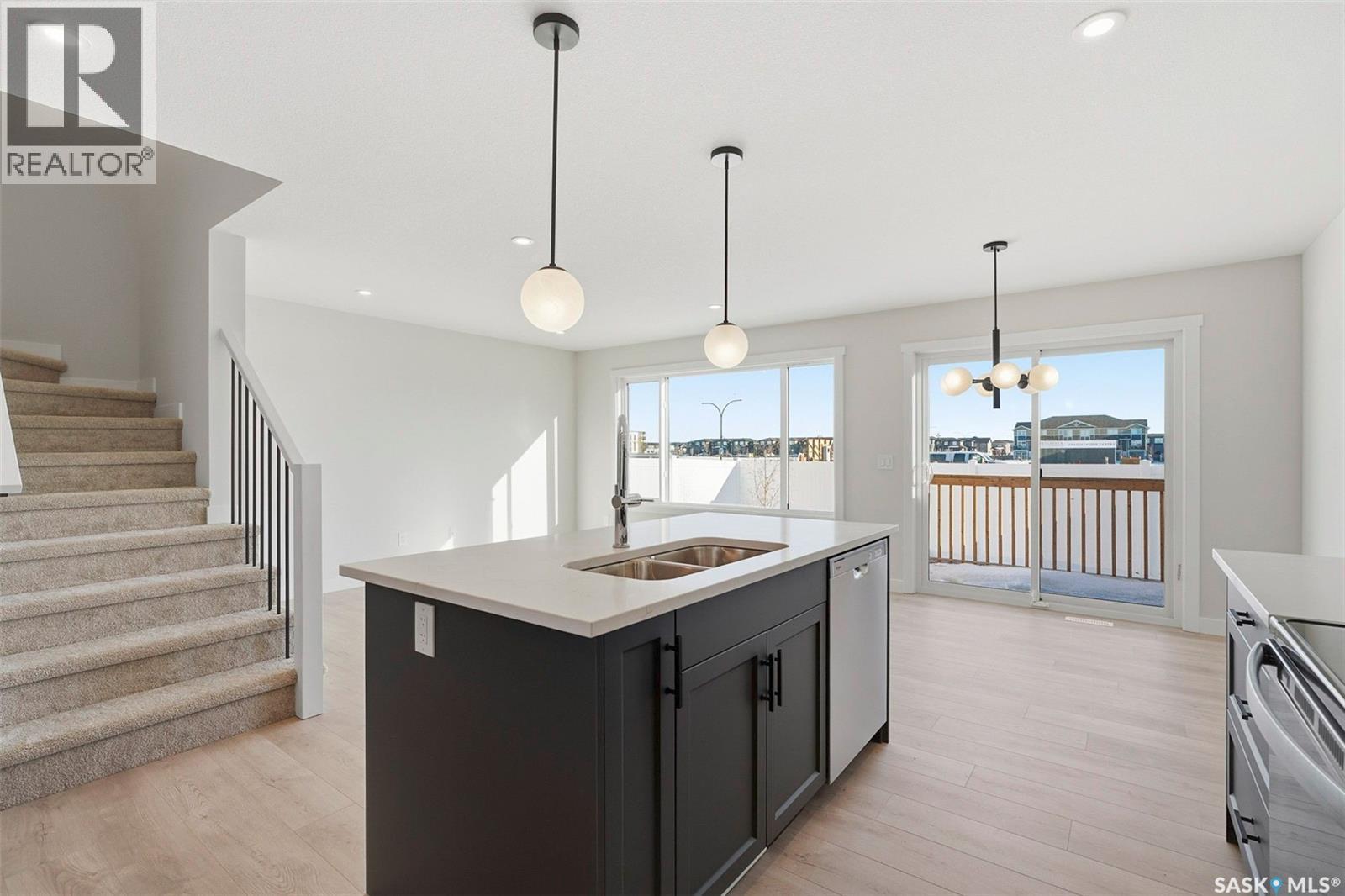 416 155 Mcfaull Way, Saskatoon, SK - Indoor Photo Showing Kitchen With Double Sink