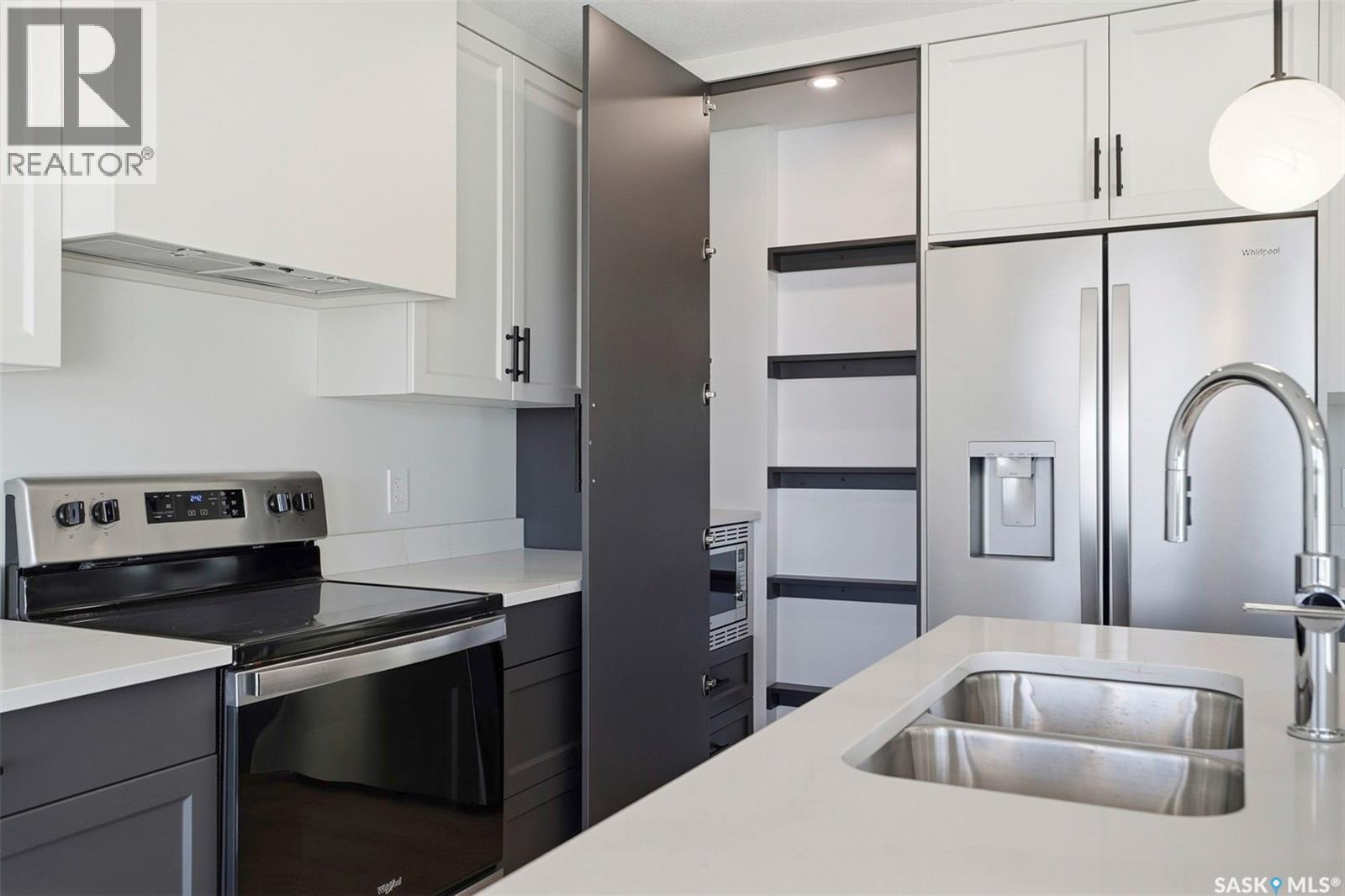 416 155 Mcfaull Way, Saskatoon, SK - Indoor Photo Showing Kitchen With Double Sink With Upgraded Kitchen