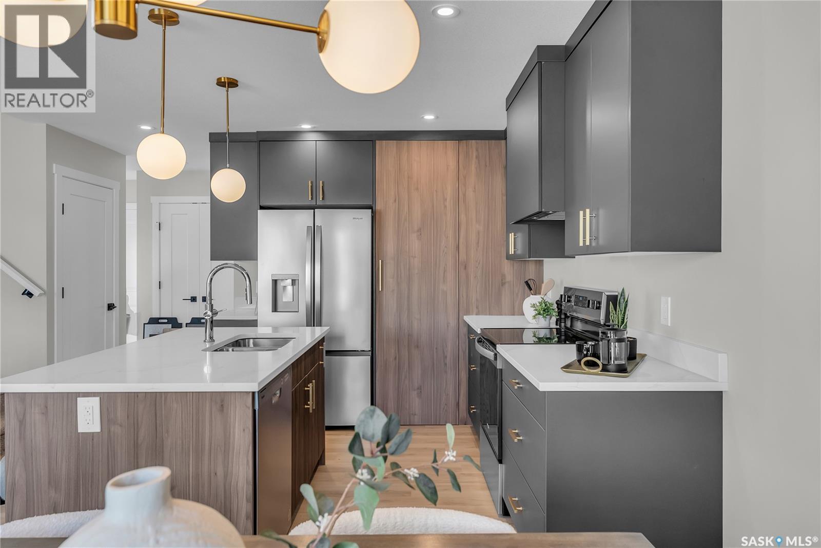 140 155 Mcfaull Way, Saskatoon, SK - Indoor Photo Showing Kitchen With Upgraded Kitchen