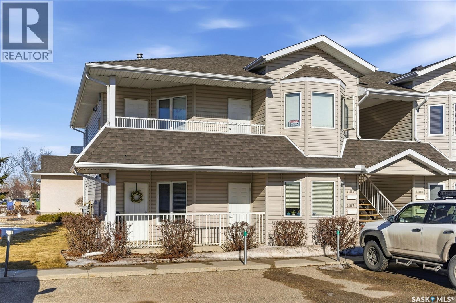 4102 Buckingham Drive E, Regina, SK - Outdoor With Deck Patio Veranda With Facade