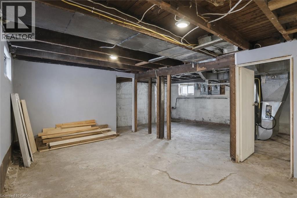 Basement with electric panel and heating unit - 260 Prospect Street S, Hamilton, ON - Indoor Photo Showing Basement