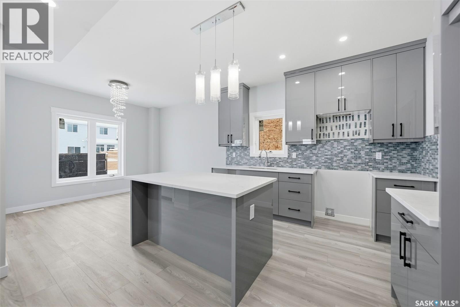 142 Sharma Lane, Saskatoon, SK - Indoor Photo Showing Kitchen With Upgraded Kitchen