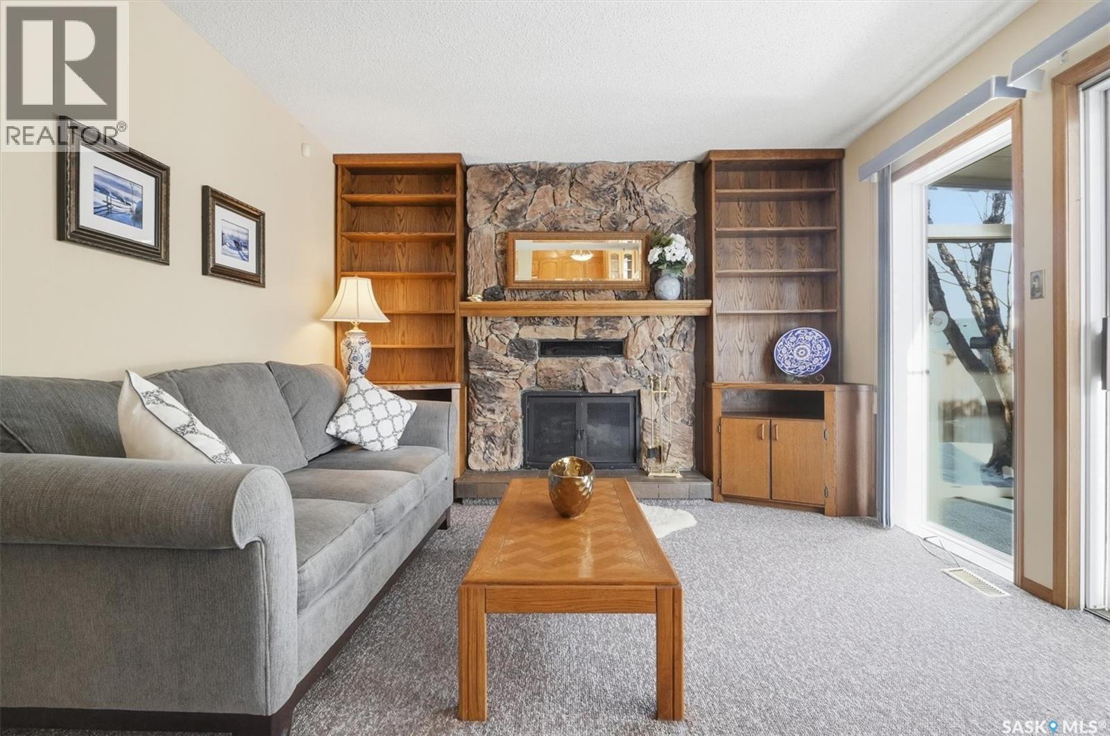 458 Charlebois Terrace, Saskatoon, SK - Indoor Photo Showing Living Room With Fireplace