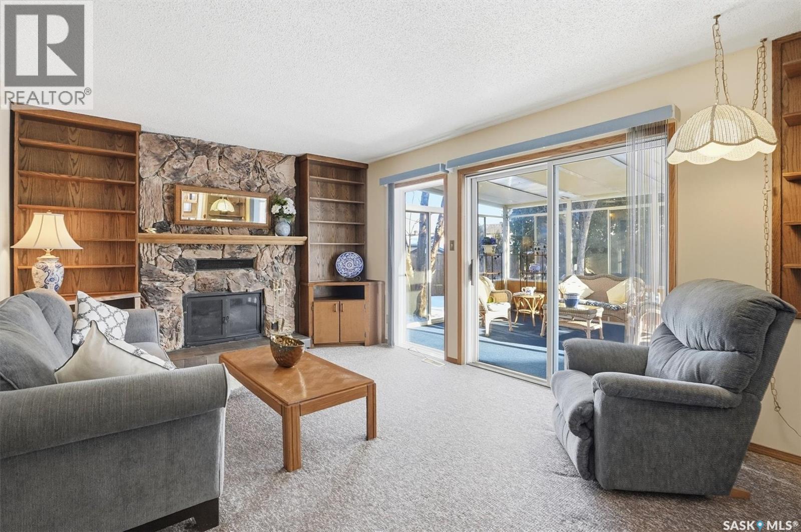 458 Charlebois Terrace, Saskatoon, SK - Indoor Photo Showing Living Room With Fireplace