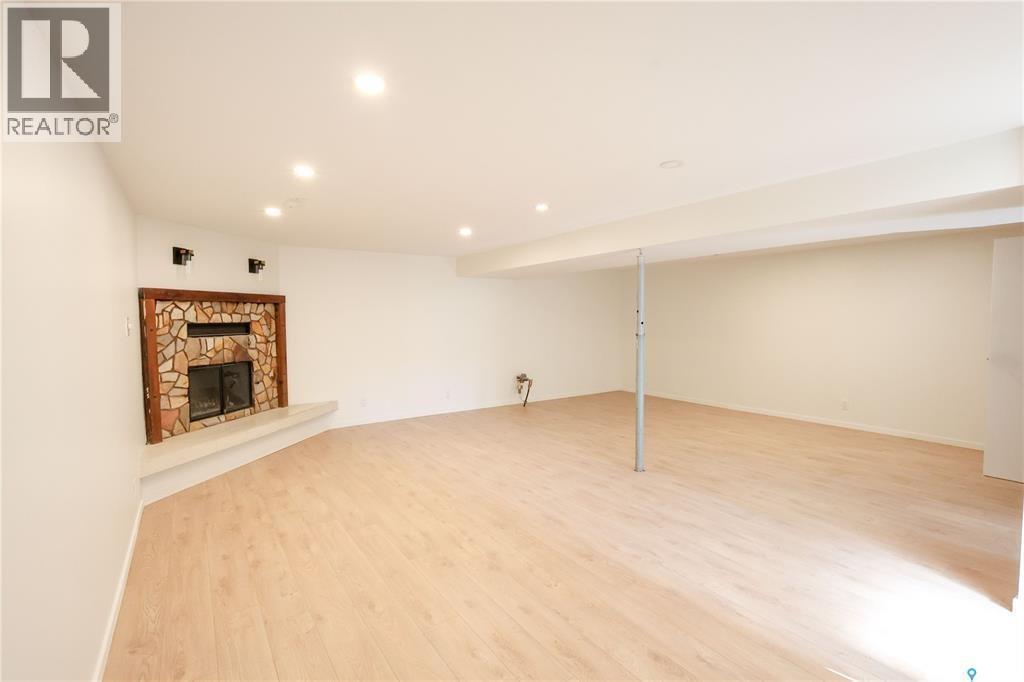 1429 Lacroix Crescent, Prince Albert, SK - Indoor Photo Showing Other Room With Fireplace