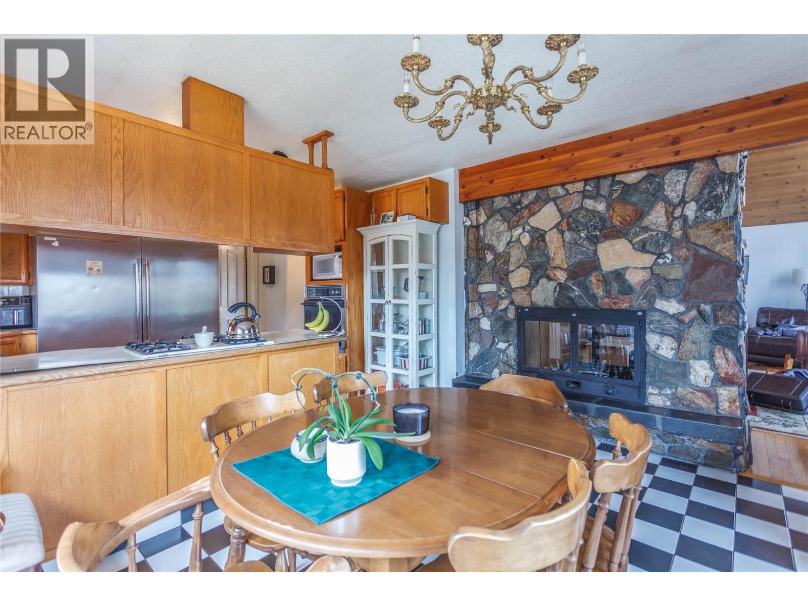 164 Cliffview Drive, Enderby, BC - Indoor Photo Showing Dining Room With Fireplace