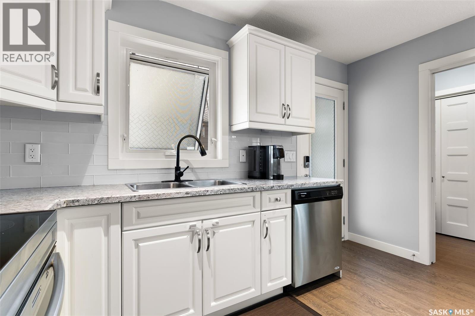 5113 Crane Crescent, Regina, SK - Indoor Photo Showing Kitchen With Double Sink