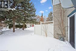 View of yard layered in snow -