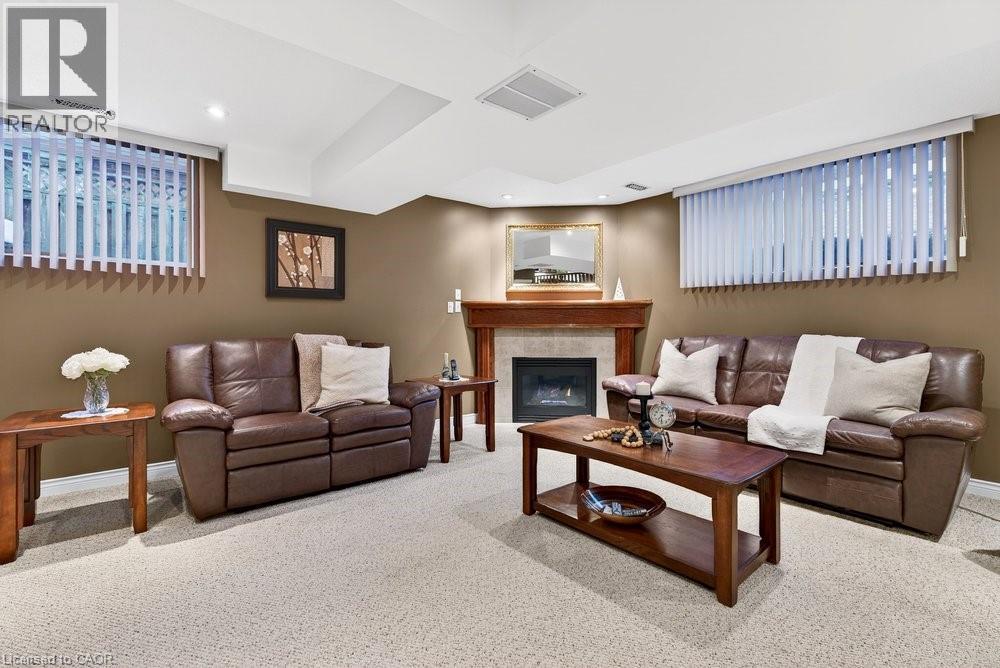 128 Nugent Drive, Hamilton, ON - Indoor Photo Showing Living Room With Fireplace