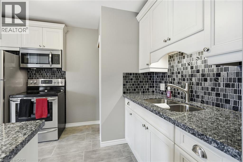 134 Balsam Avenue N, Hamilton, ON - Indoor Photo Showing Kitchen With Stainless Steel Kitchen With Double Sink