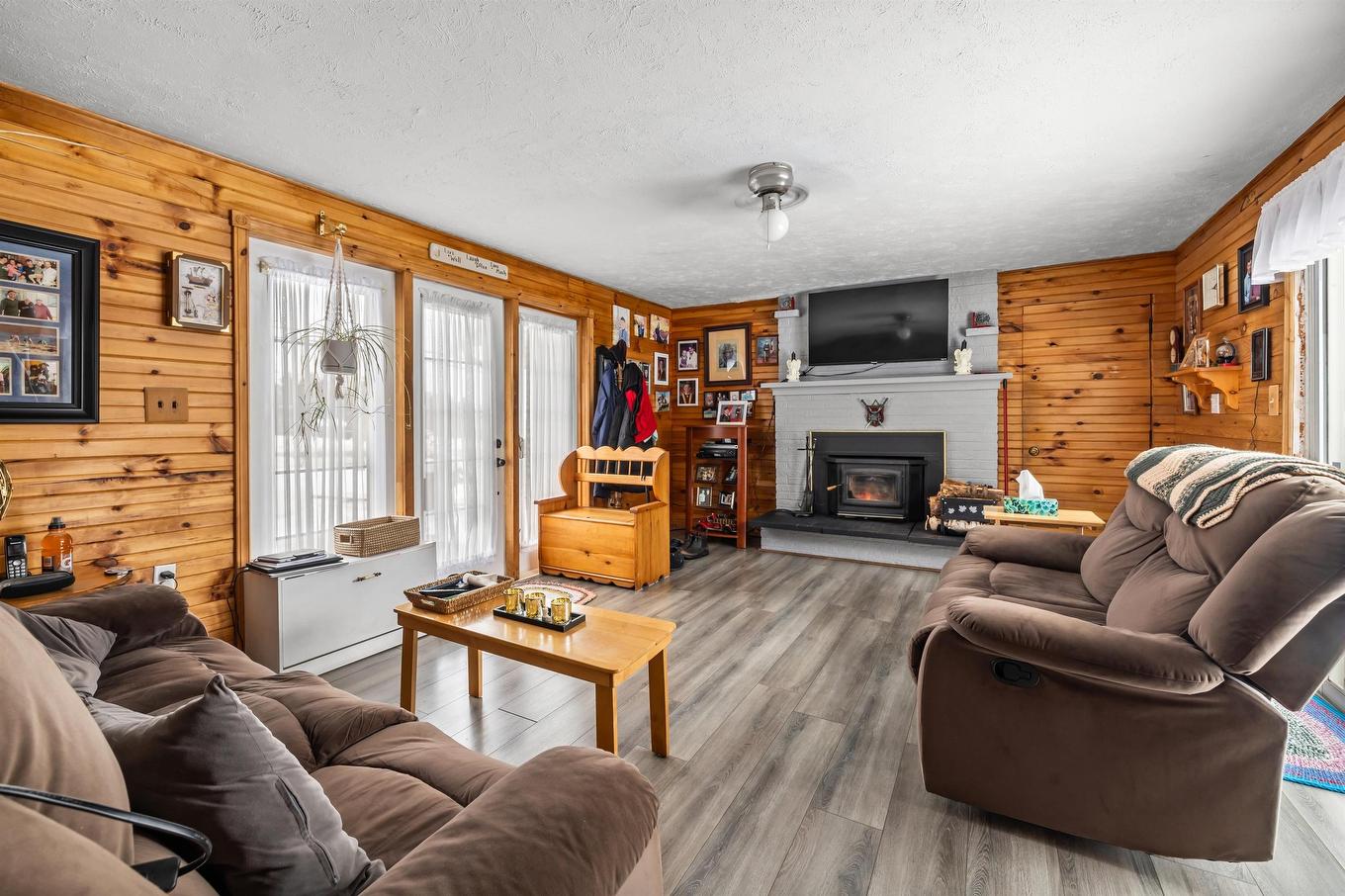 467 Route 2, Souris West, PE - Indoor Photo Showing Living Room With Fireplace