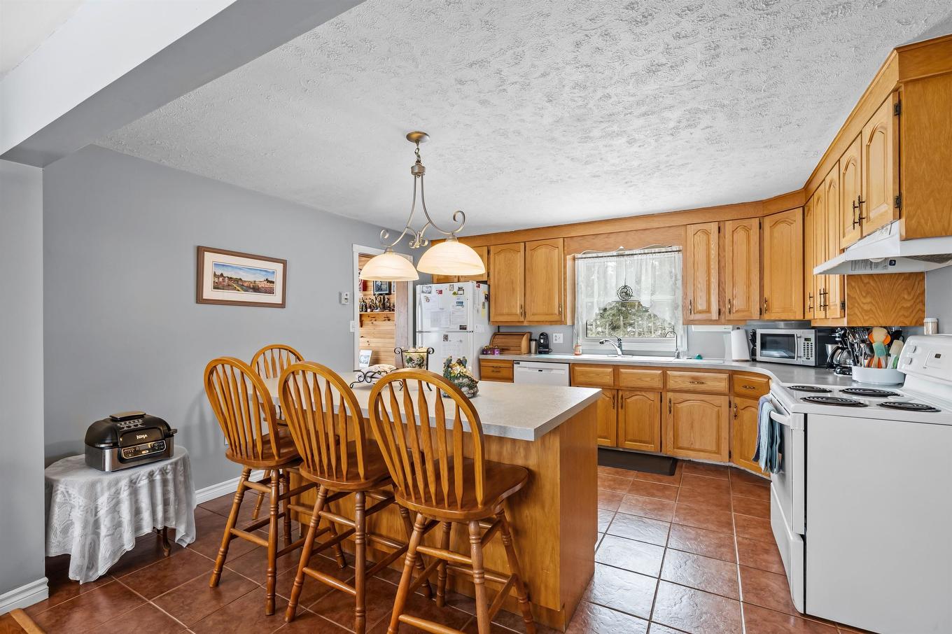467 Route 2, Souris West, PE - Indoor Photo Showing Kitchen With Double Sink