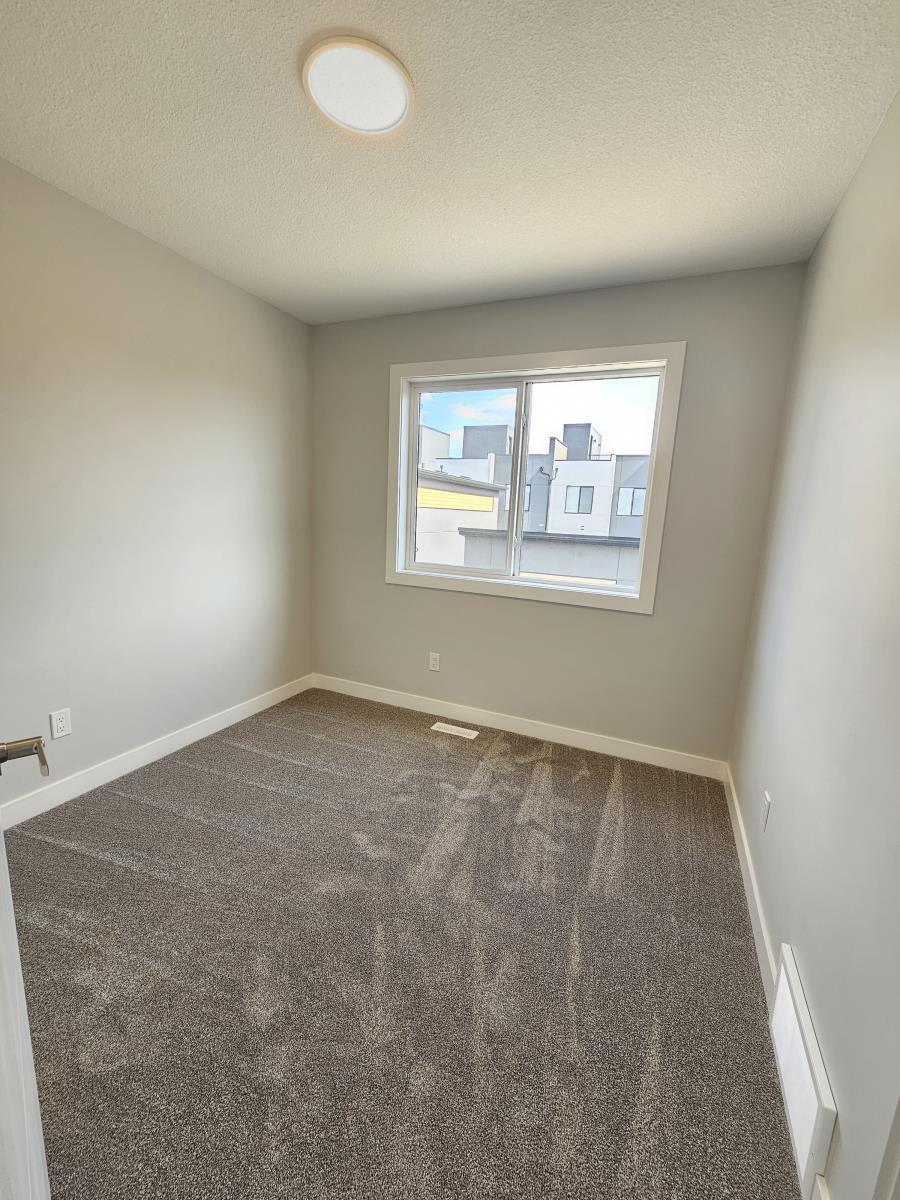 8069-8073 Cedric Mah Rd, Edmonton, AB - Indoor Photo Showing Other Room