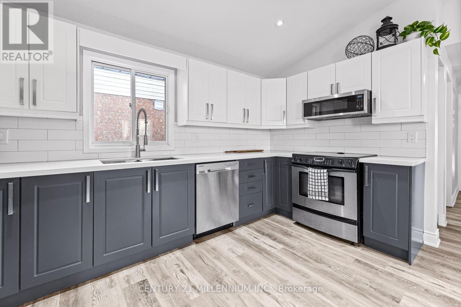 82 Orchid Crescent, Kitchener, ON - Indoor Photo Showing Kitchen With Double Sink