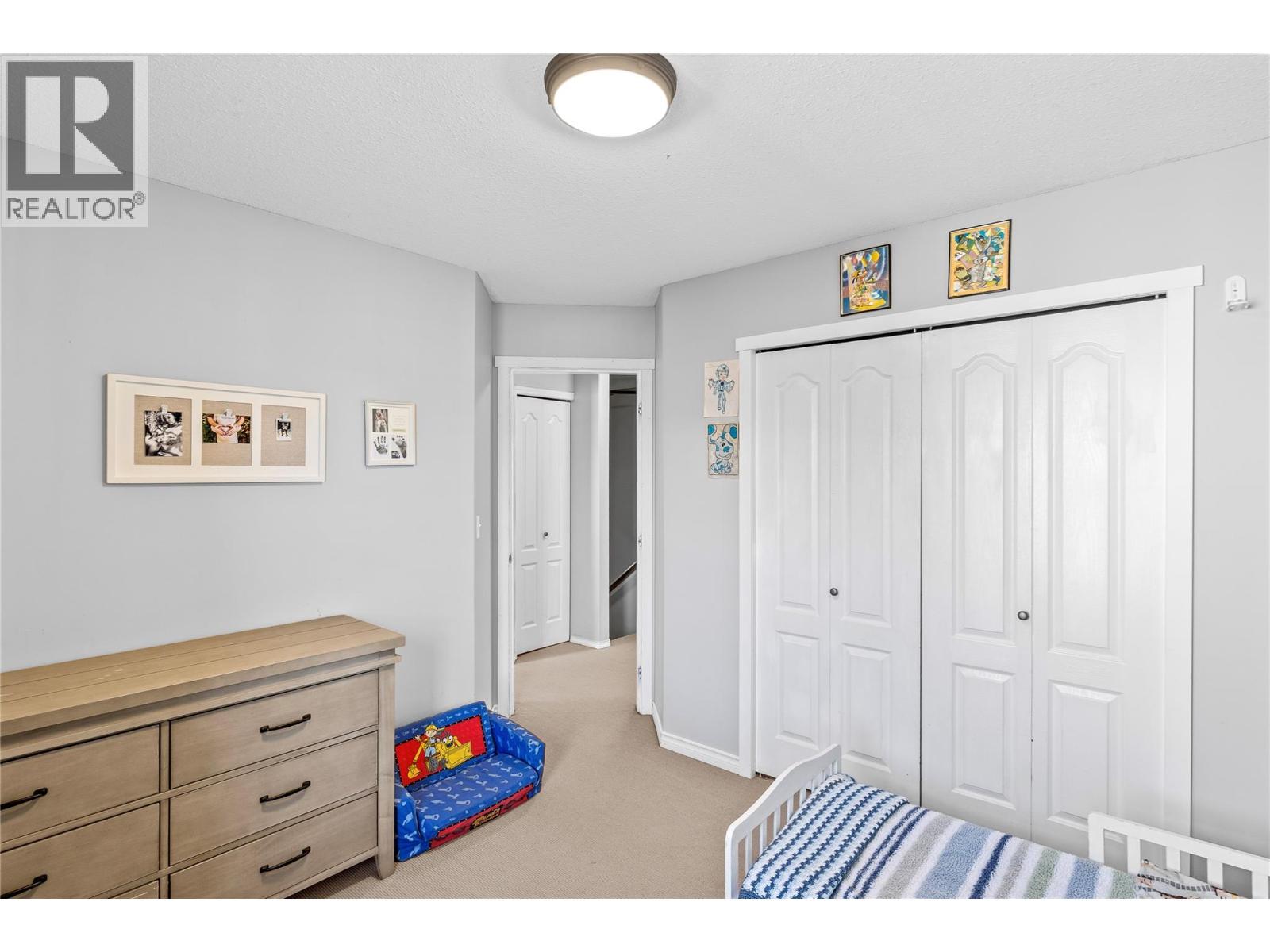 2395 Pleasant Valley Road Unit# 14, Armstrong, BC - Indoor Photo Showing Bedroom
