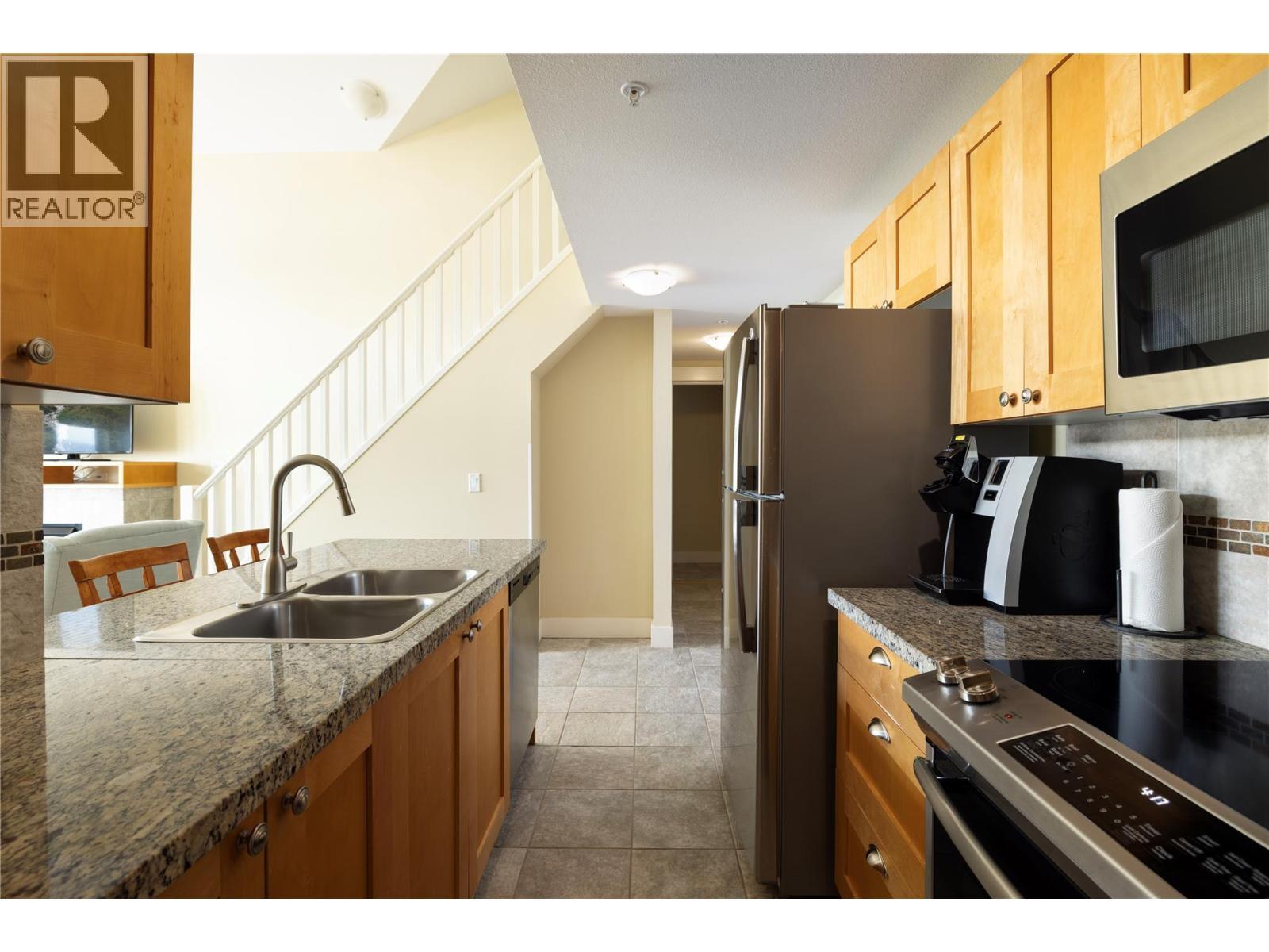 4205 Gellatly Road Unit# 416, West Kelowna, BC - Indoor Photo Showing Kitchen With Double Sink
