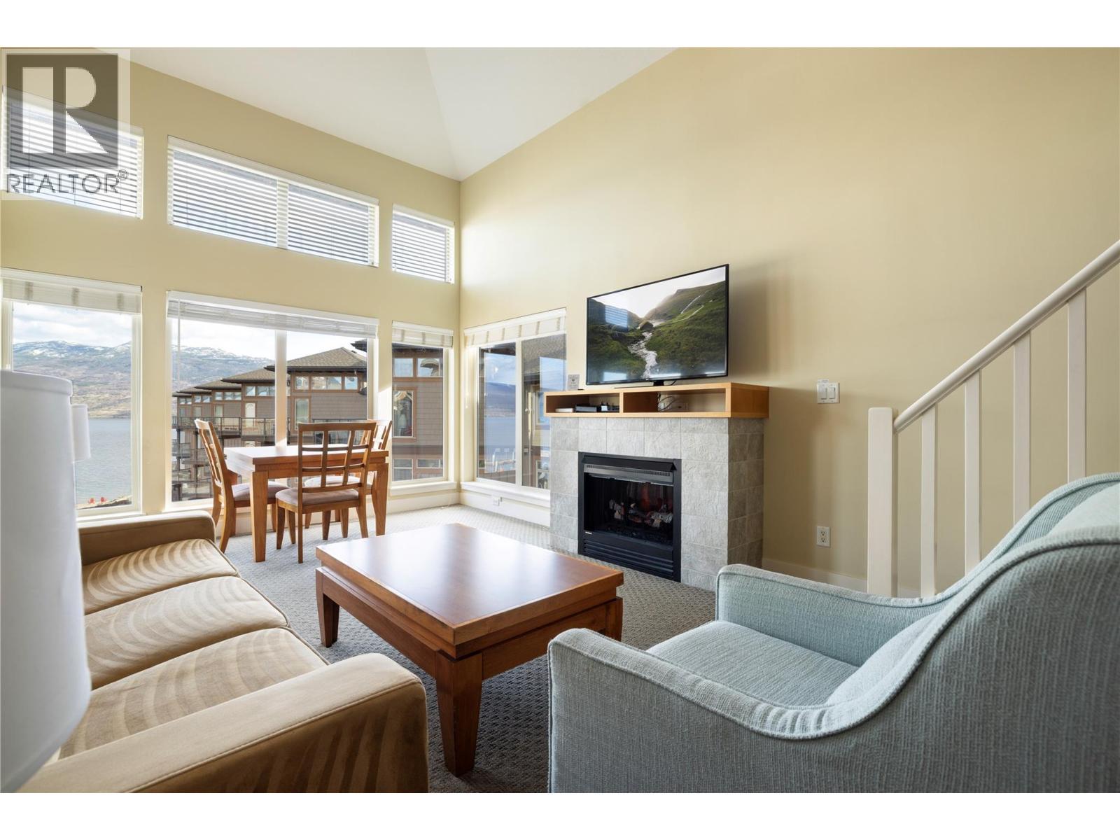 All furnishings included. - 4205 Gellatly Road Unit# 416, West Kelowna, BC - Indoor With Fireplace