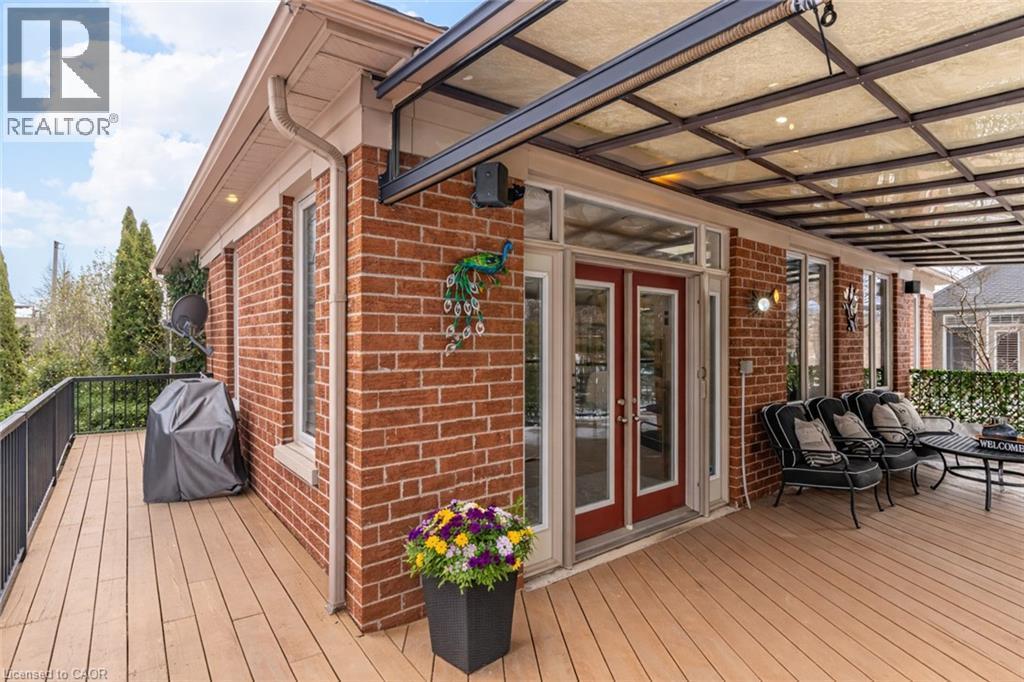 Wooden terrace with a grill and french doors - 17 Mcnutt Street, Brampton, ON - Outdoor With Deck Patio Veranda With Exterior