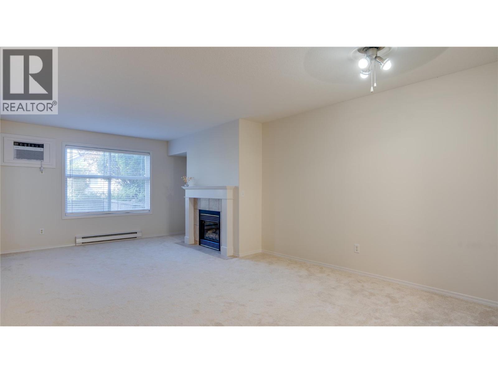 555 Houghton Road Unit# 115, Kelowna, BC - Indoor With Fireplace