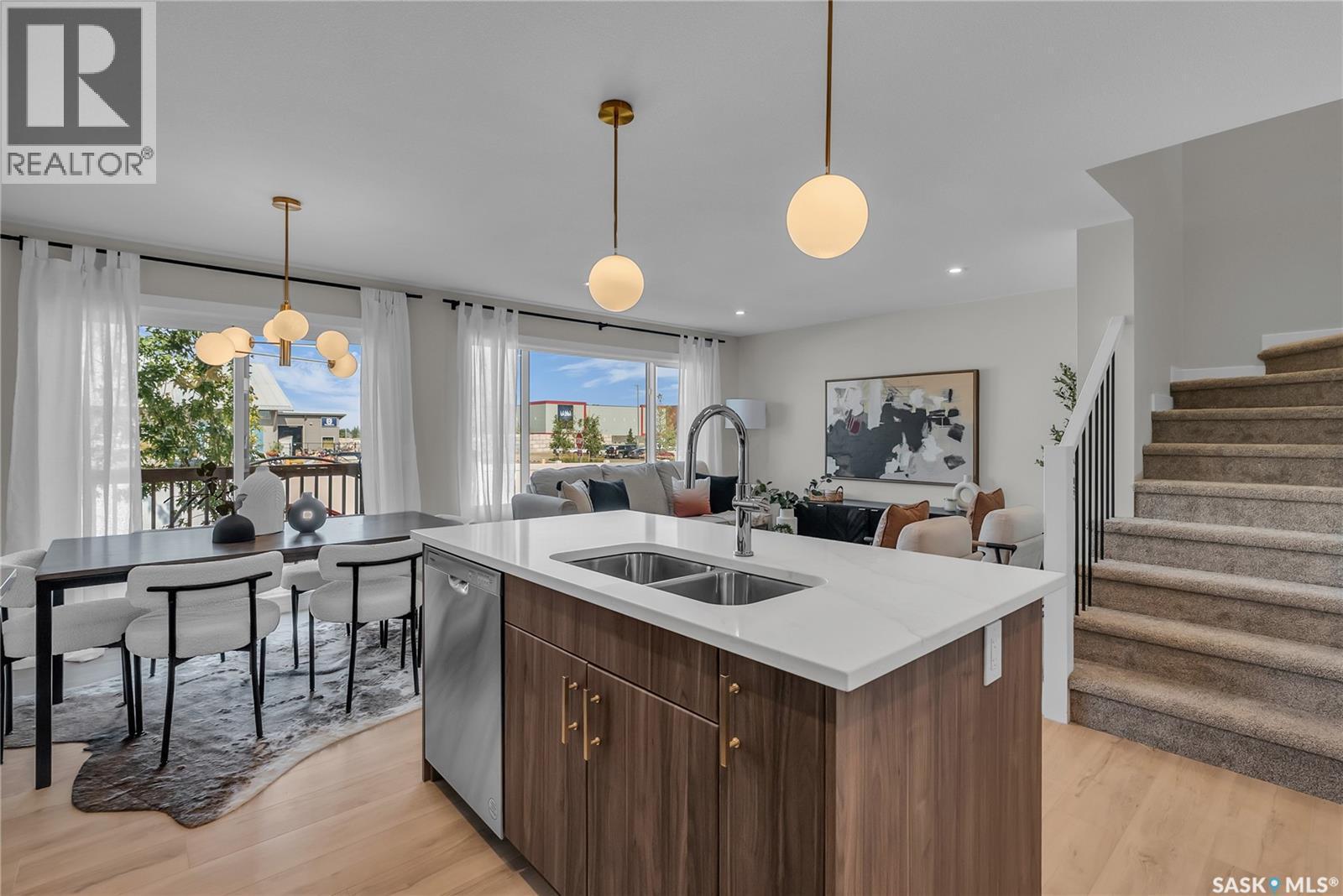 138 155 Mcfaull Way, Saskatoon, SK - Indoor Photo Showing Kitchen With Double Sink