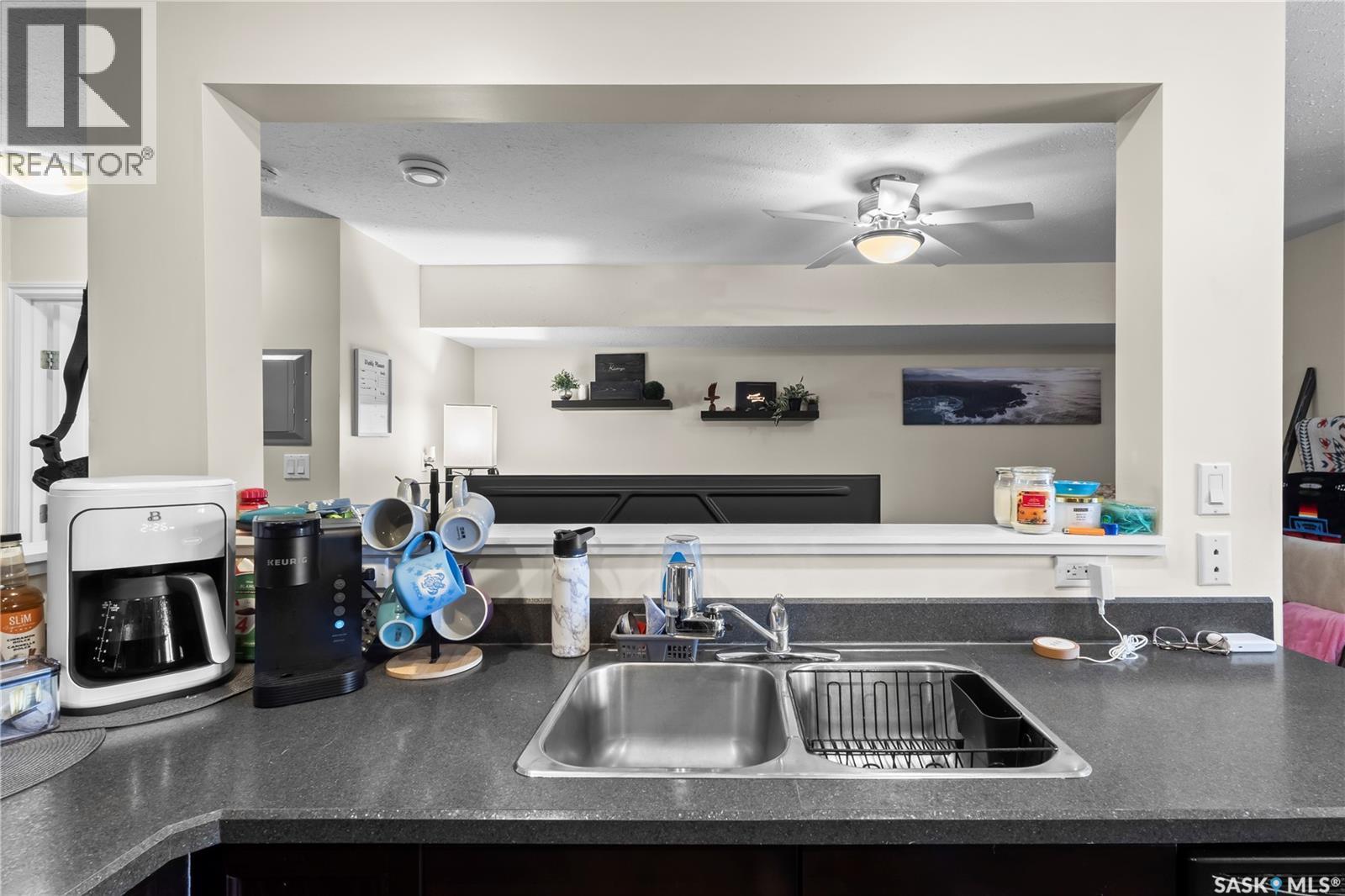 217 515 28Th Street E, Prince Albert, SK - Indoor Photo Showing Kitchen With Double Sink