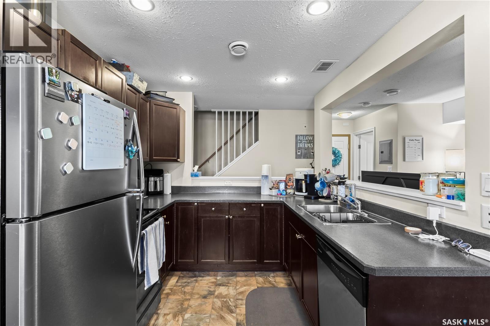 217 515 28Th Street E, Prince Albert, SK - Indoor Photo Showing Kitchen With Double Sink