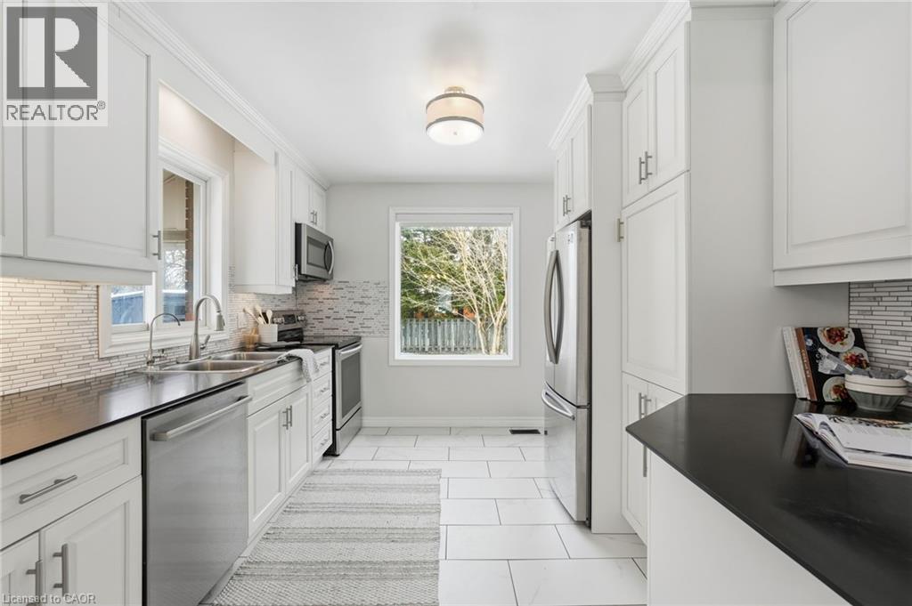 15 Mulock Avenue, Hamilton, ON - Indoor Photo Showing Kitchen With Double Sink With Upgraded Kitchen