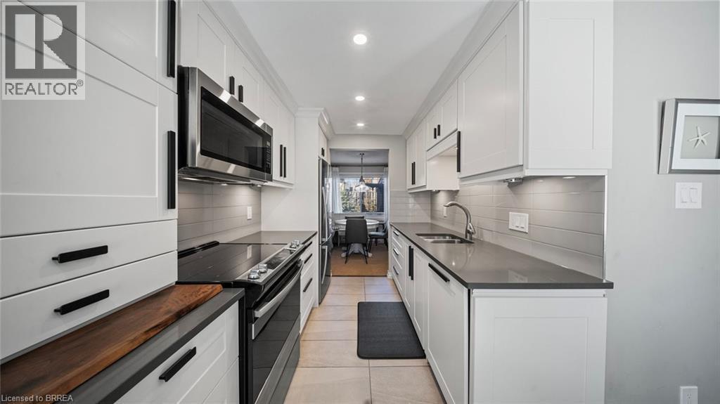 23 Freeman Crescent, Simcoe, ON - Indoor Photo Showing Kitchen With Double Sink With Upgraded Kitchen