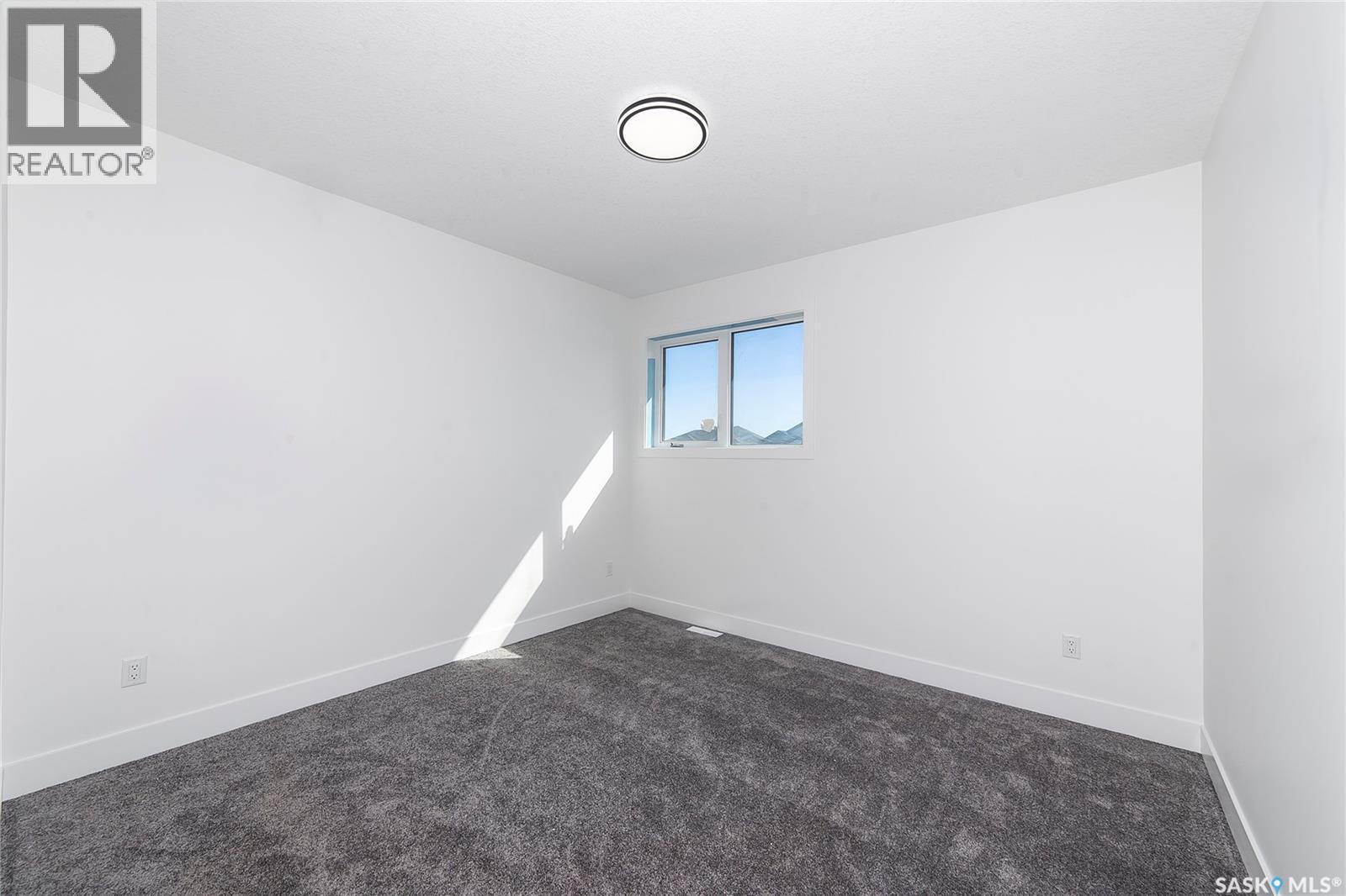 447 Woolf Bend, Saskatoon, SK - Indoor Photo Showing Other Room