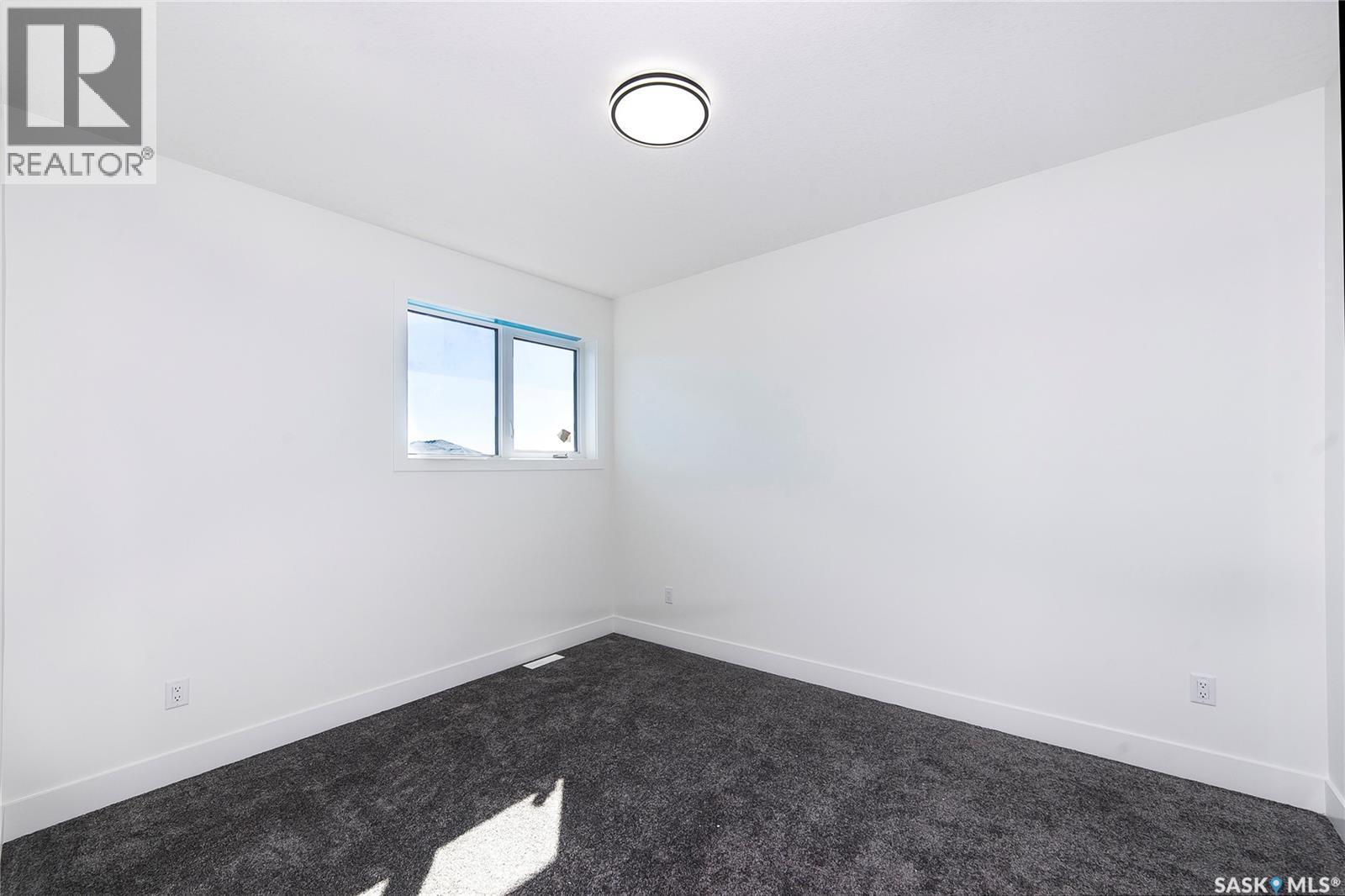 447 Woolf Bend, Saskatoon, SK - Indoor Photo Showing Other Room