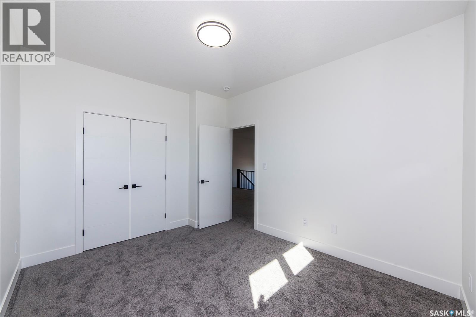 447 Woolf Bend, Saskatoon, SK - Indoor Photo Showing Other Room