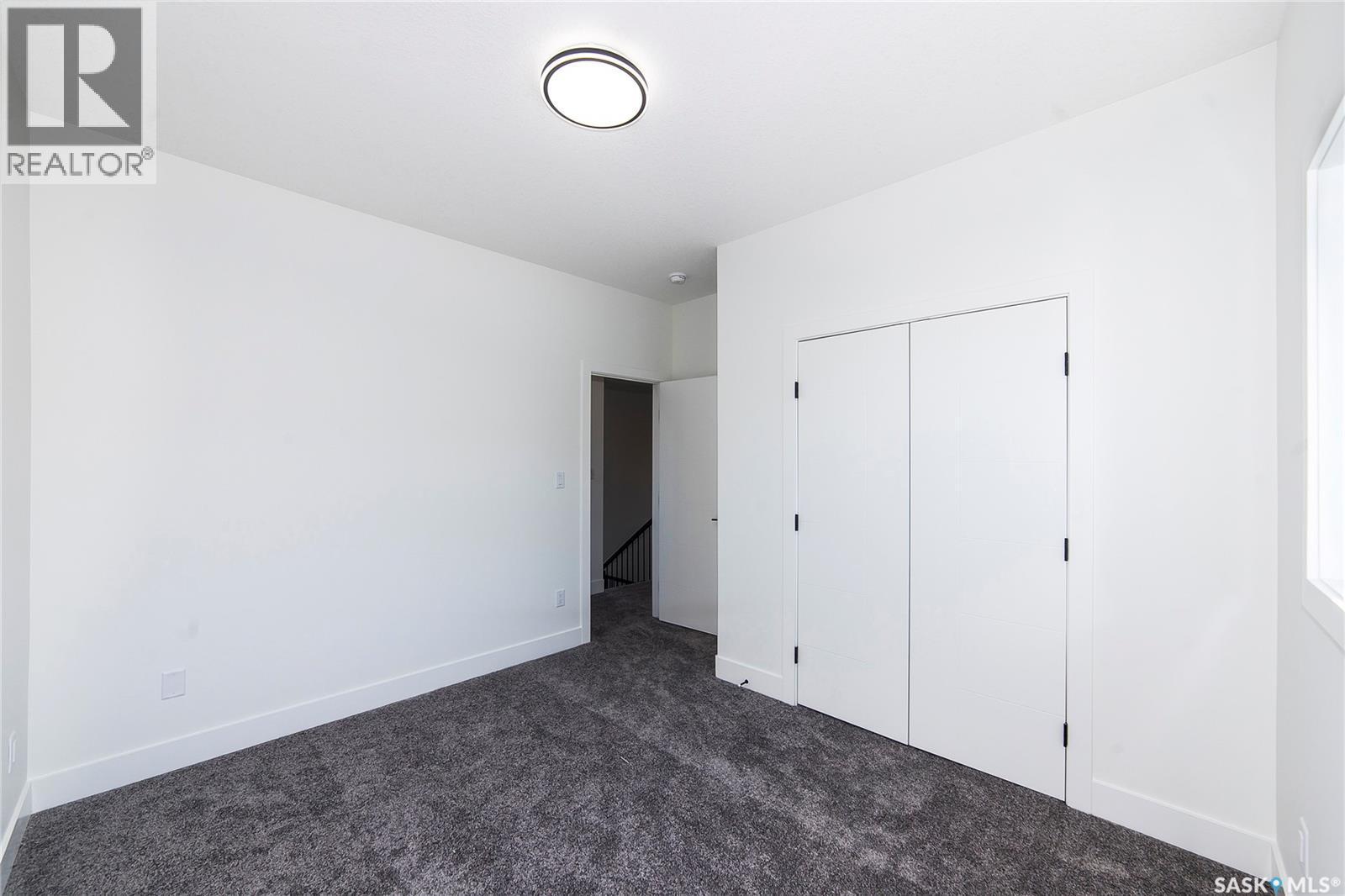 447 Woolf Bend, Saskatoon, SK - Indoor Photo Showing Other Room